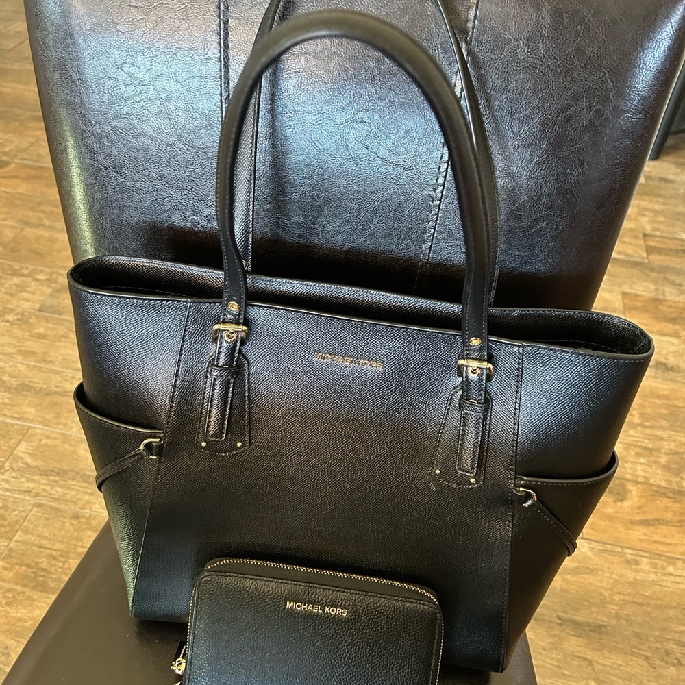 Michael Kors Black Leather Tote with Gold Accents including matching wallet.